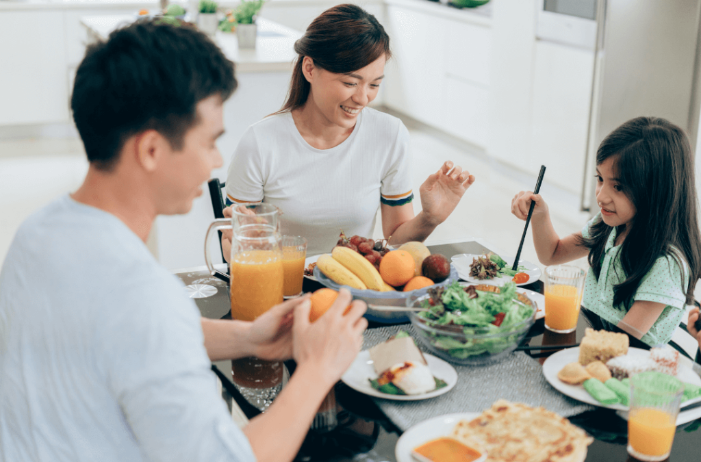 Family eating meal together at table