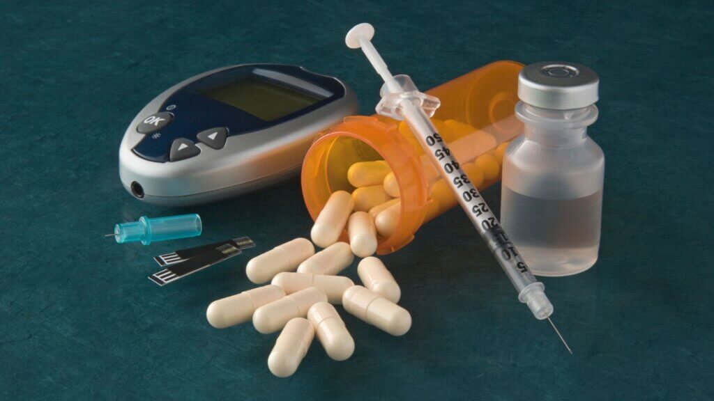 Diabetes medications on a teal background