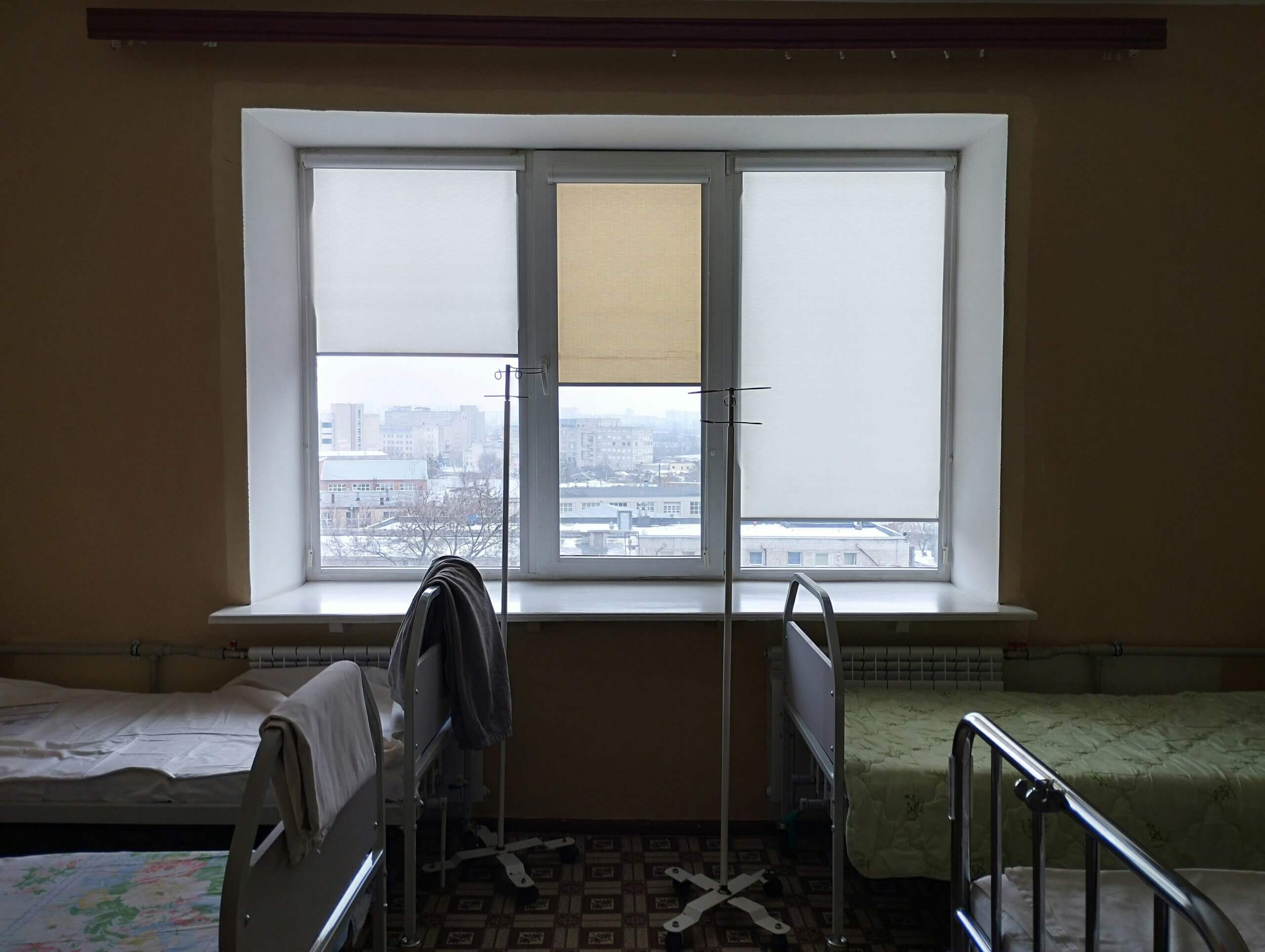 Image of four beds in a room